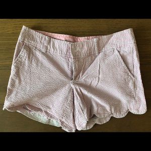 Pink seersucker shorts with scallop hem